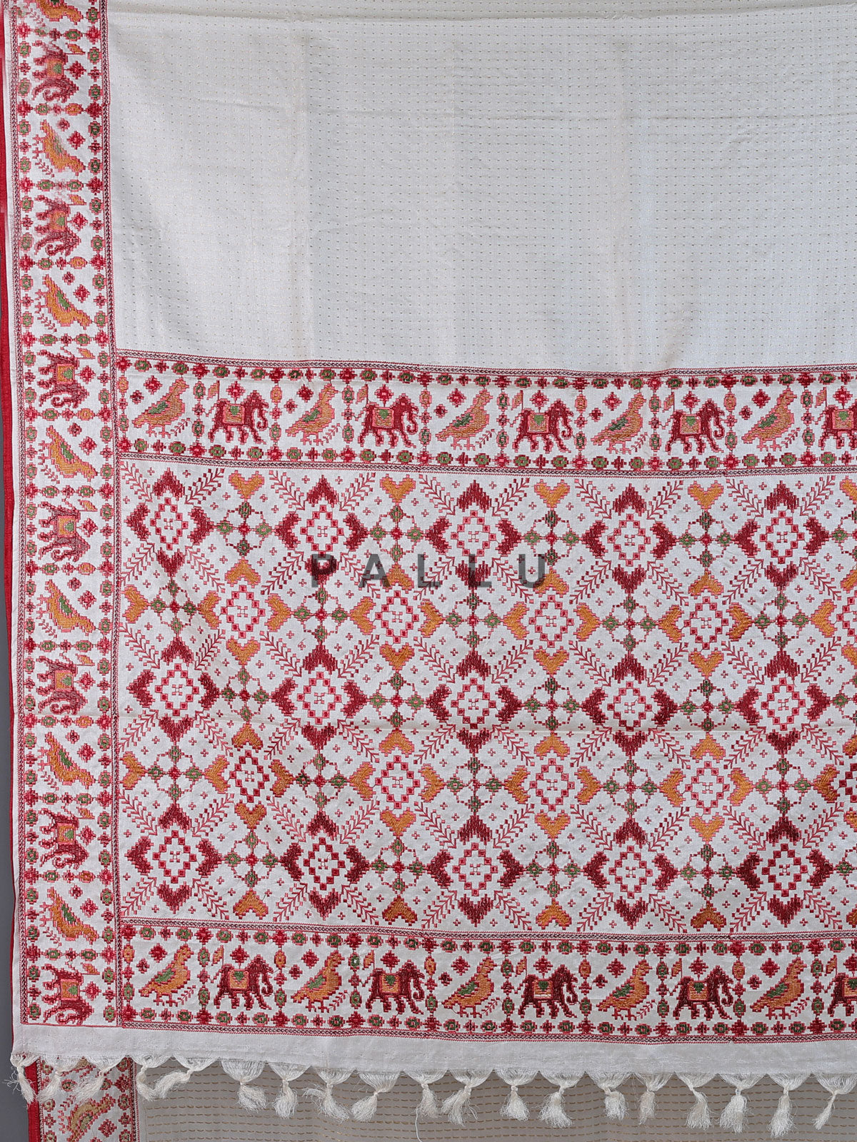 Off white tusser silk saree with heritage elephant zari motifs