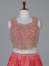 Pink silk bandhej lehenga choli with mirror and tassel work