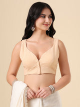 Beige cotton solid blouse with front open sleeveless design