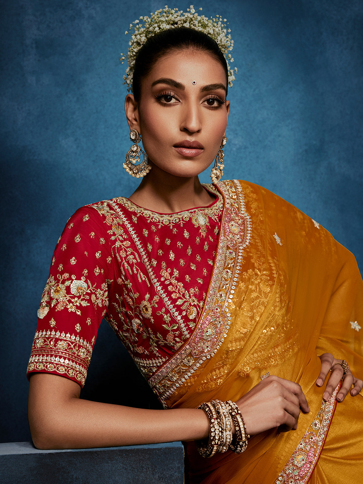 Mustard yellow tissue silk saree for wedding celebrations