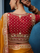 Mustard yellow tissue silk saree for wedding celebrations