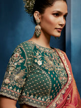 Peach tissue silk saree with intricate heavy work