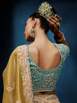 Beige tissue silk saree for graceful wedding celebrations