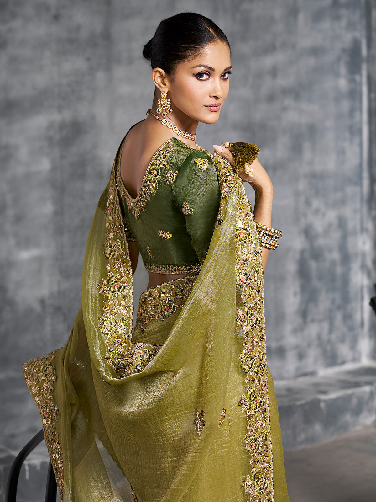 Olive green viscose tissue saree with embellished border