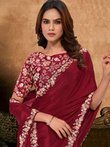 Maroon crepe silk saree with embellished border