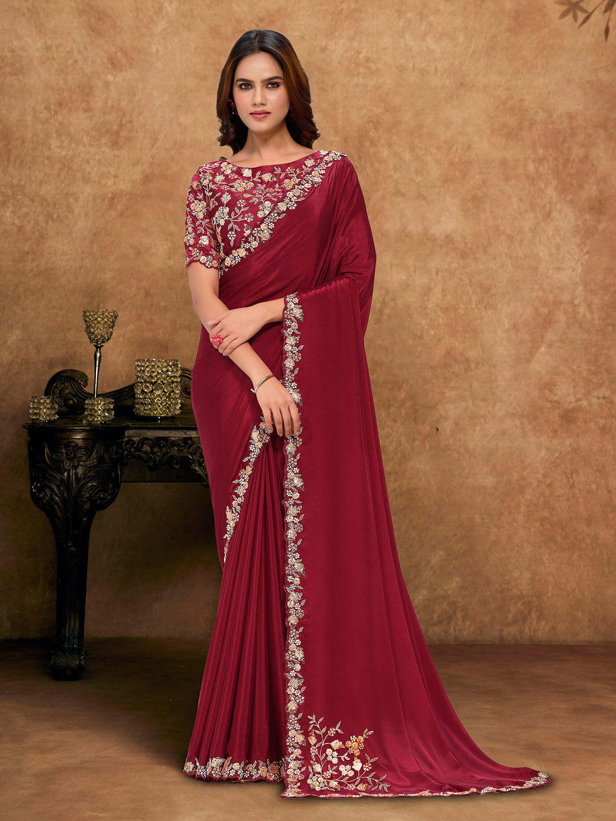 Maroon crepe silk saree with embellished border