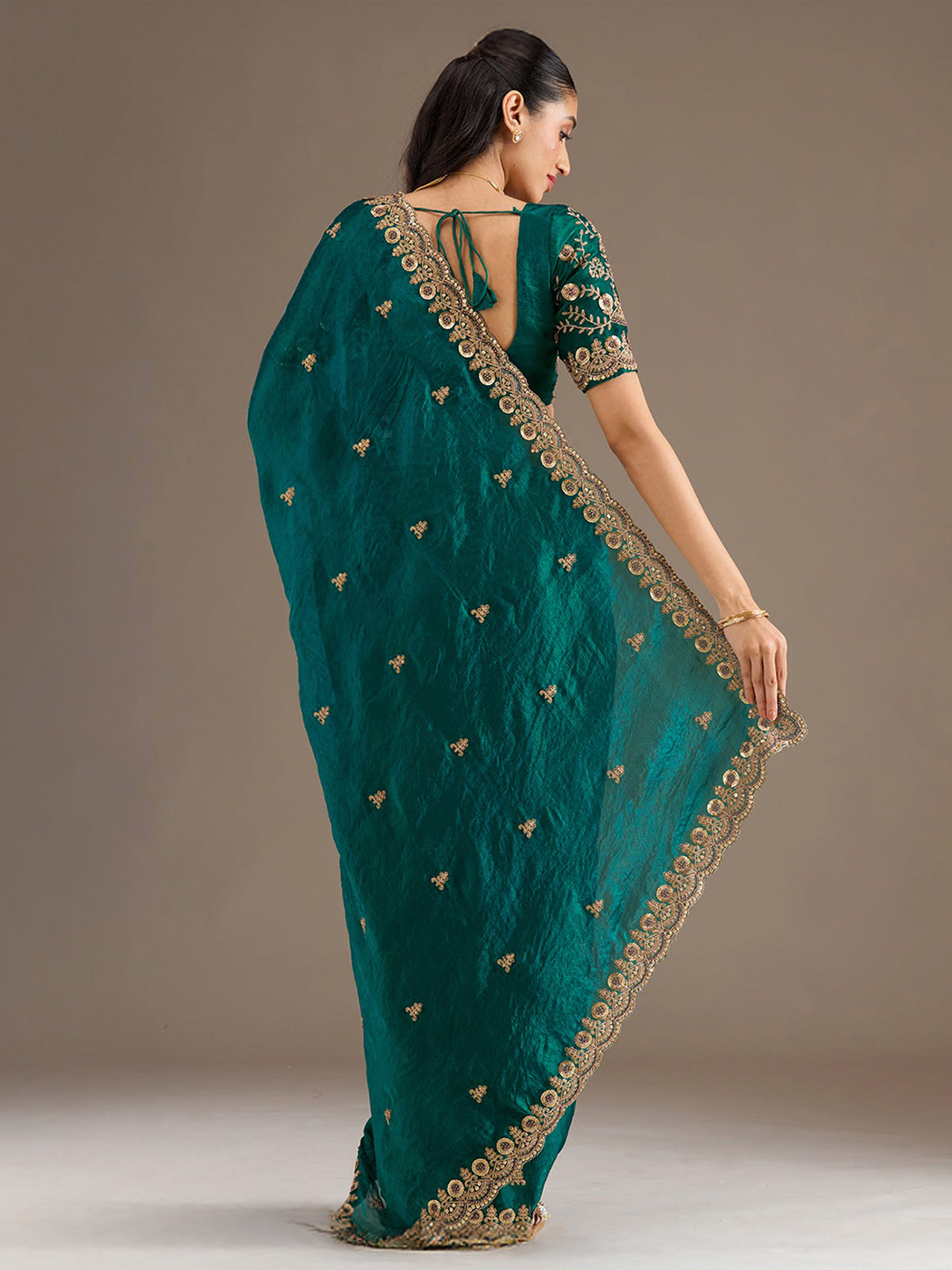 Rama green tissue saree for party celebration
