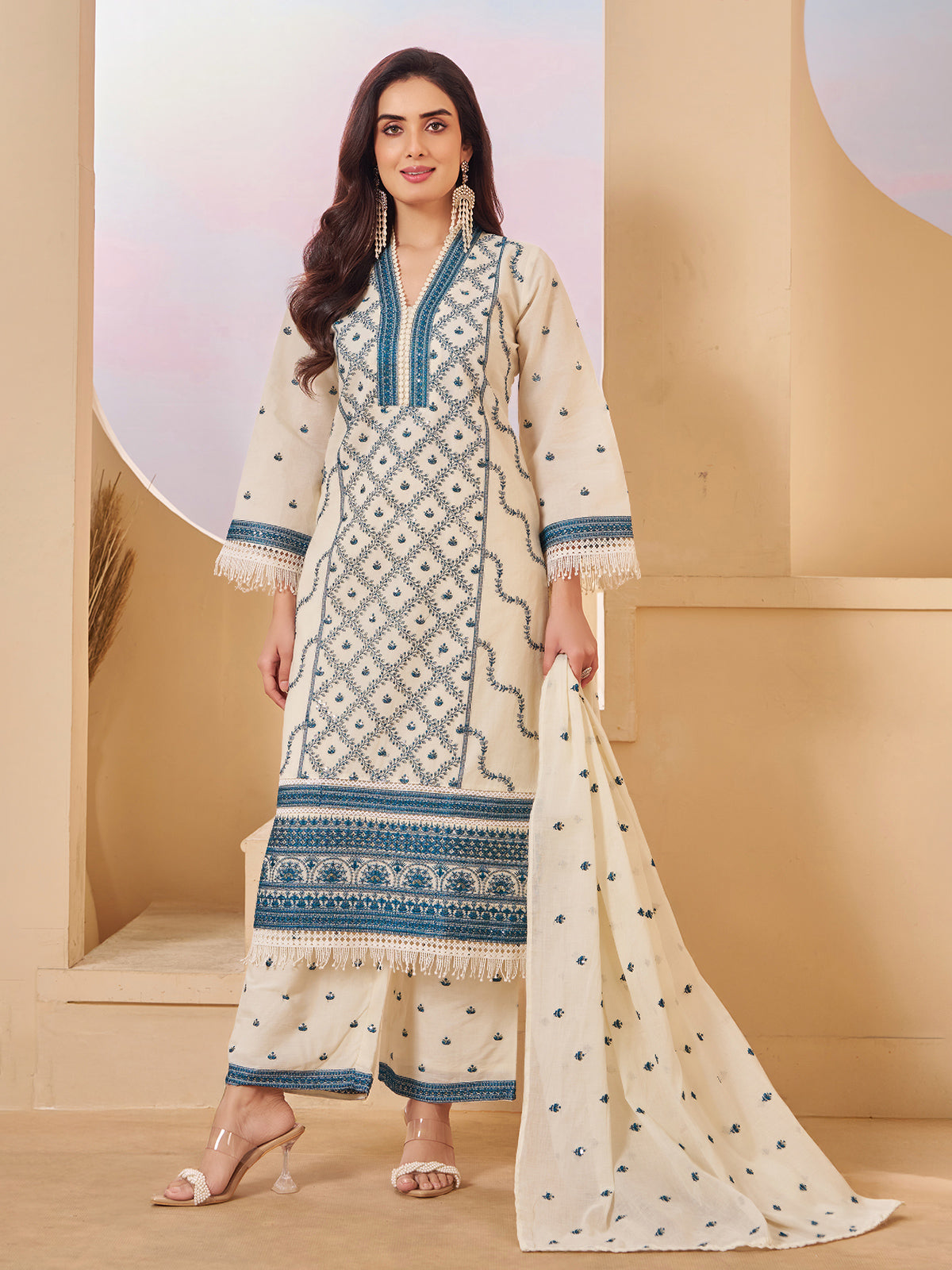 Cream cotton pakistani salwar suit with embroidery detailing