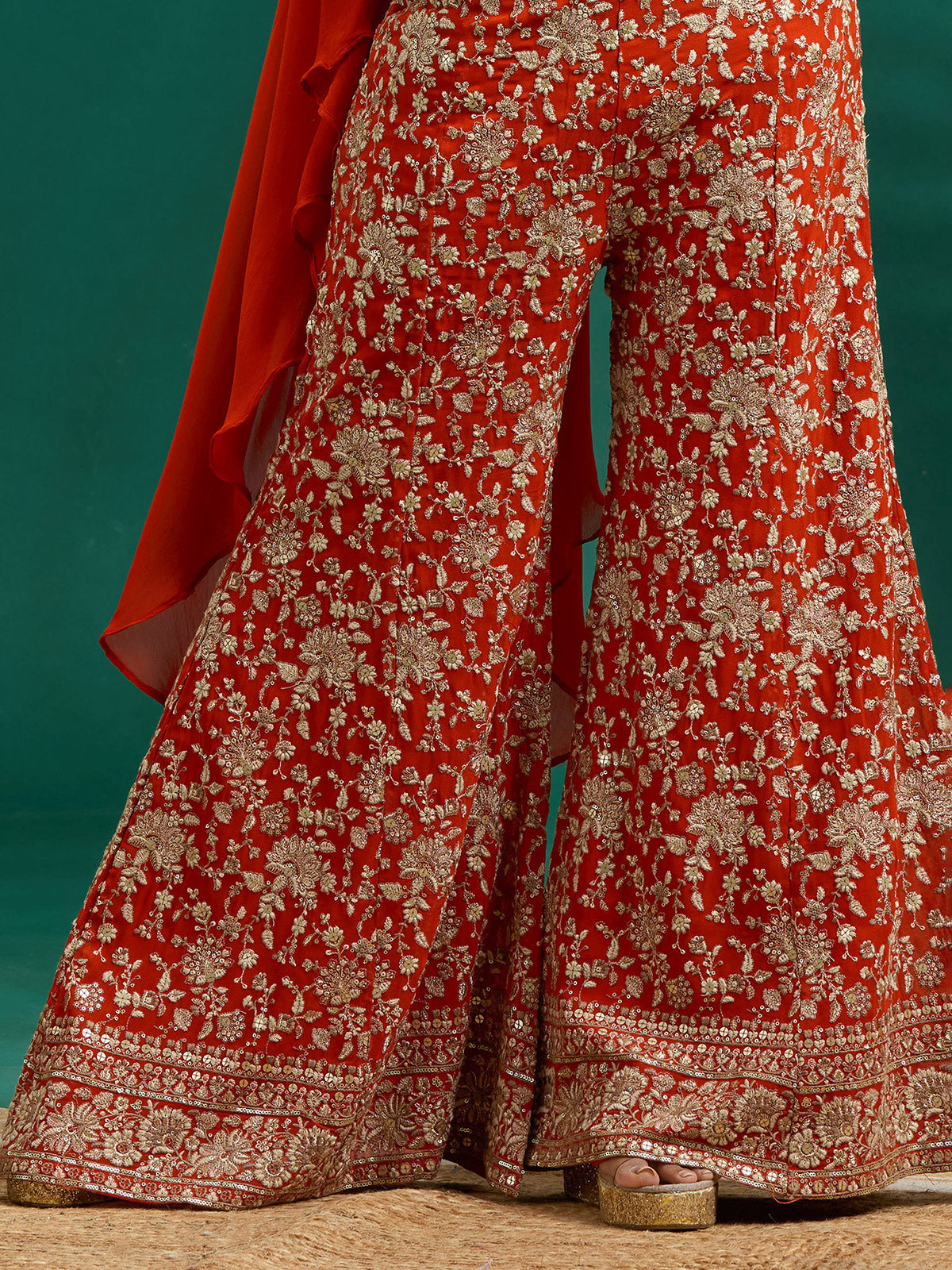 Rich rust orange palazzo set with intricate embroidery