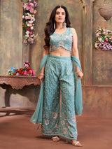Blue silk palazzo suit with tassel embellishments