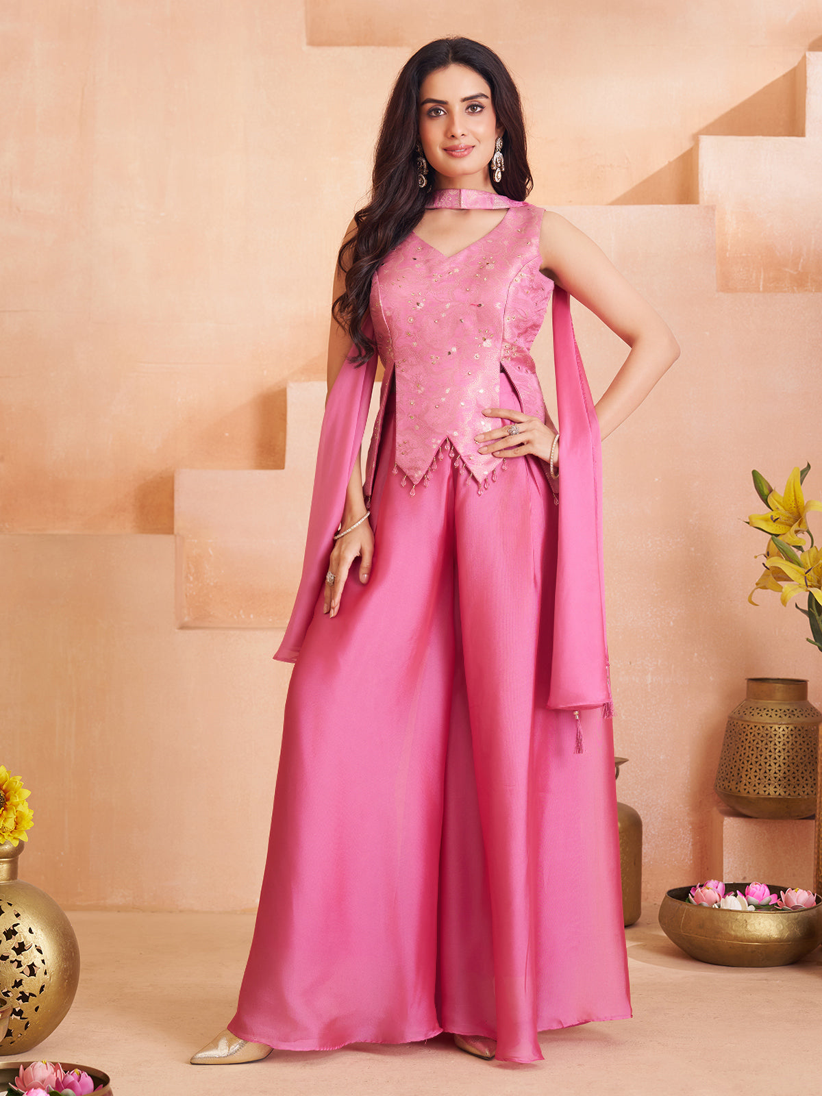 Pink silk palazzo suit with elegant tassel detailing