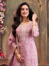 Pastel pink silk straight suit with subtle shimmer