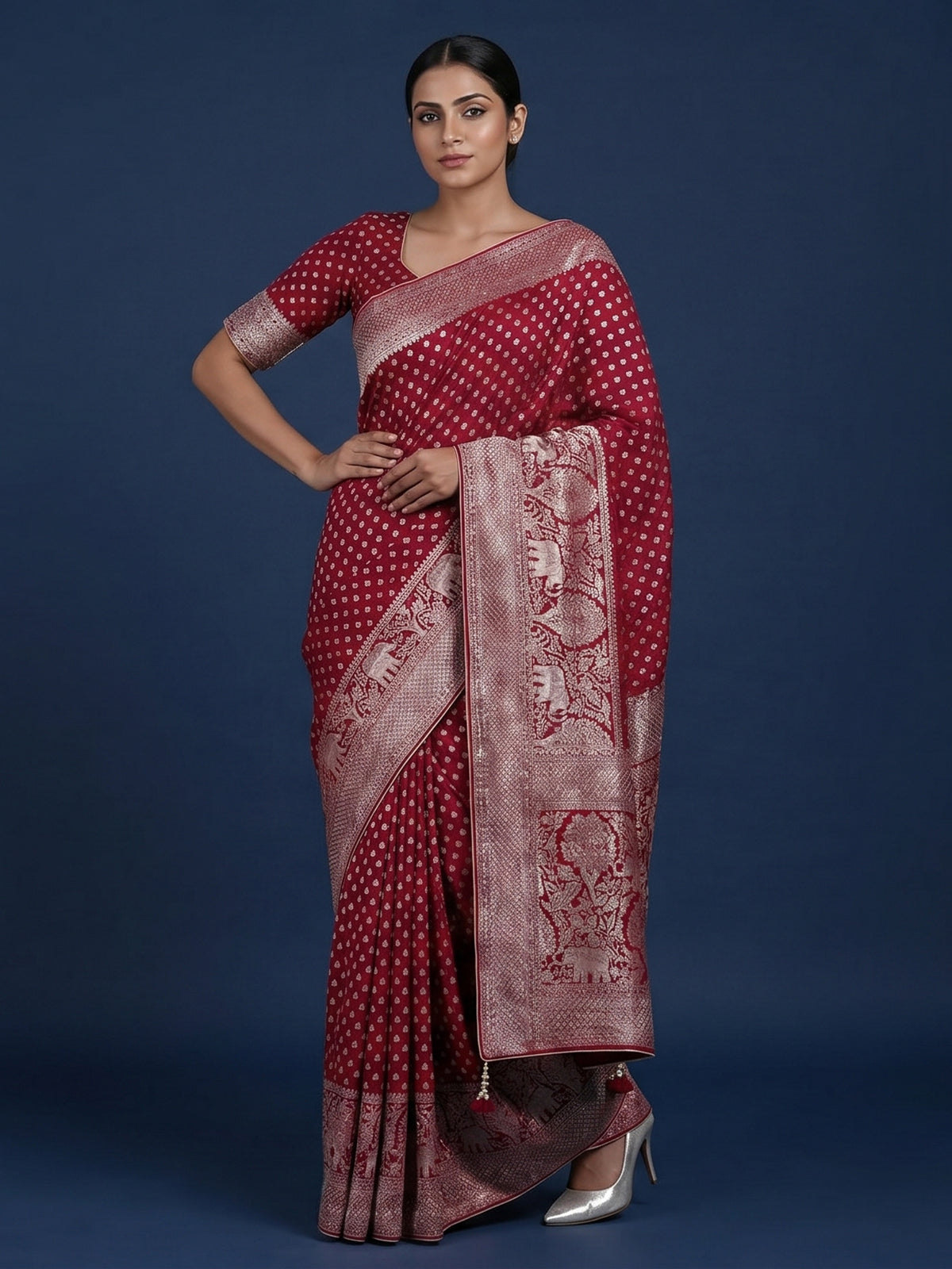 Maroon dola silk saree with elephant motif zari design
