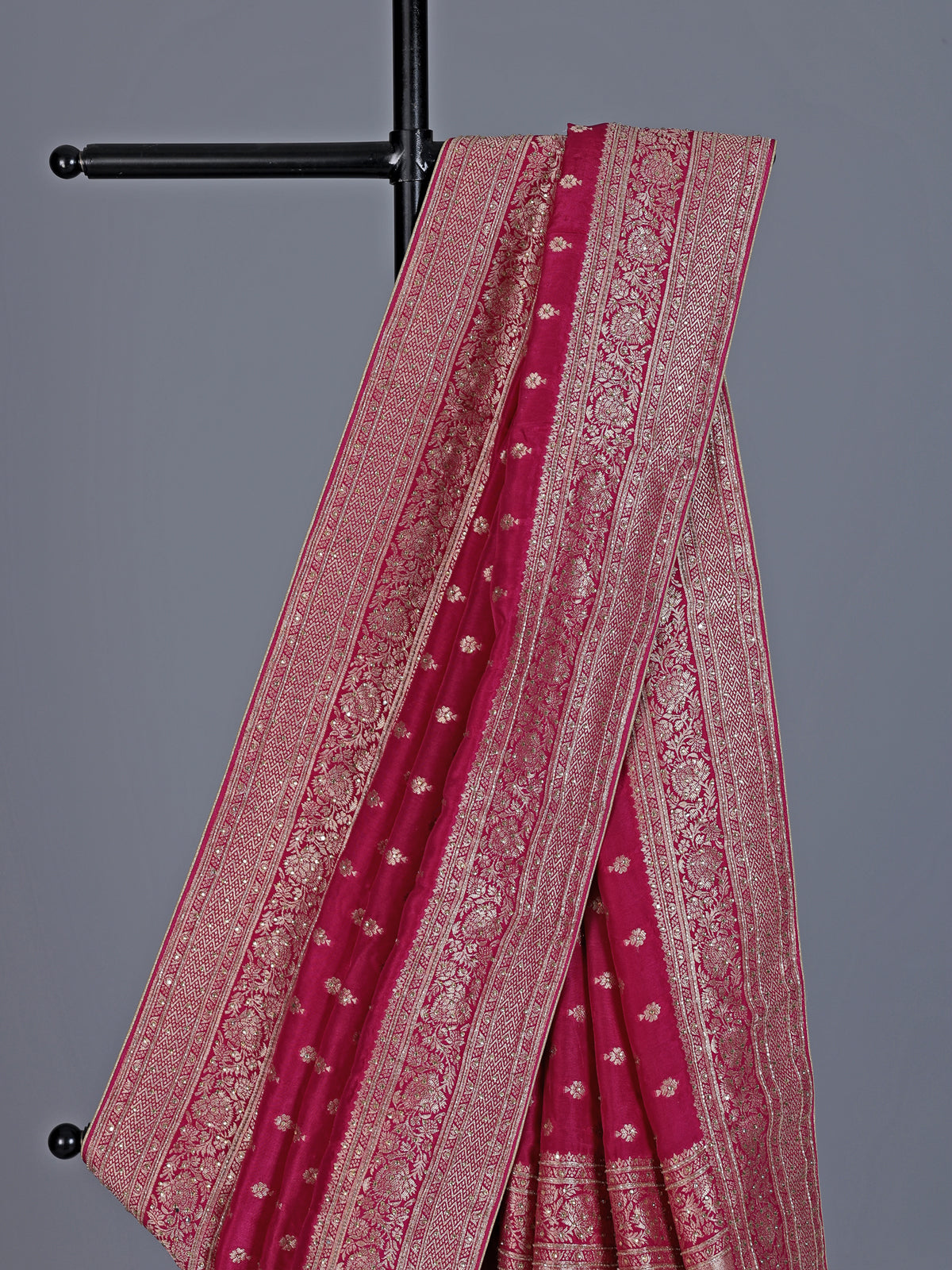 Maroon dola silk saree with rich zari butti design