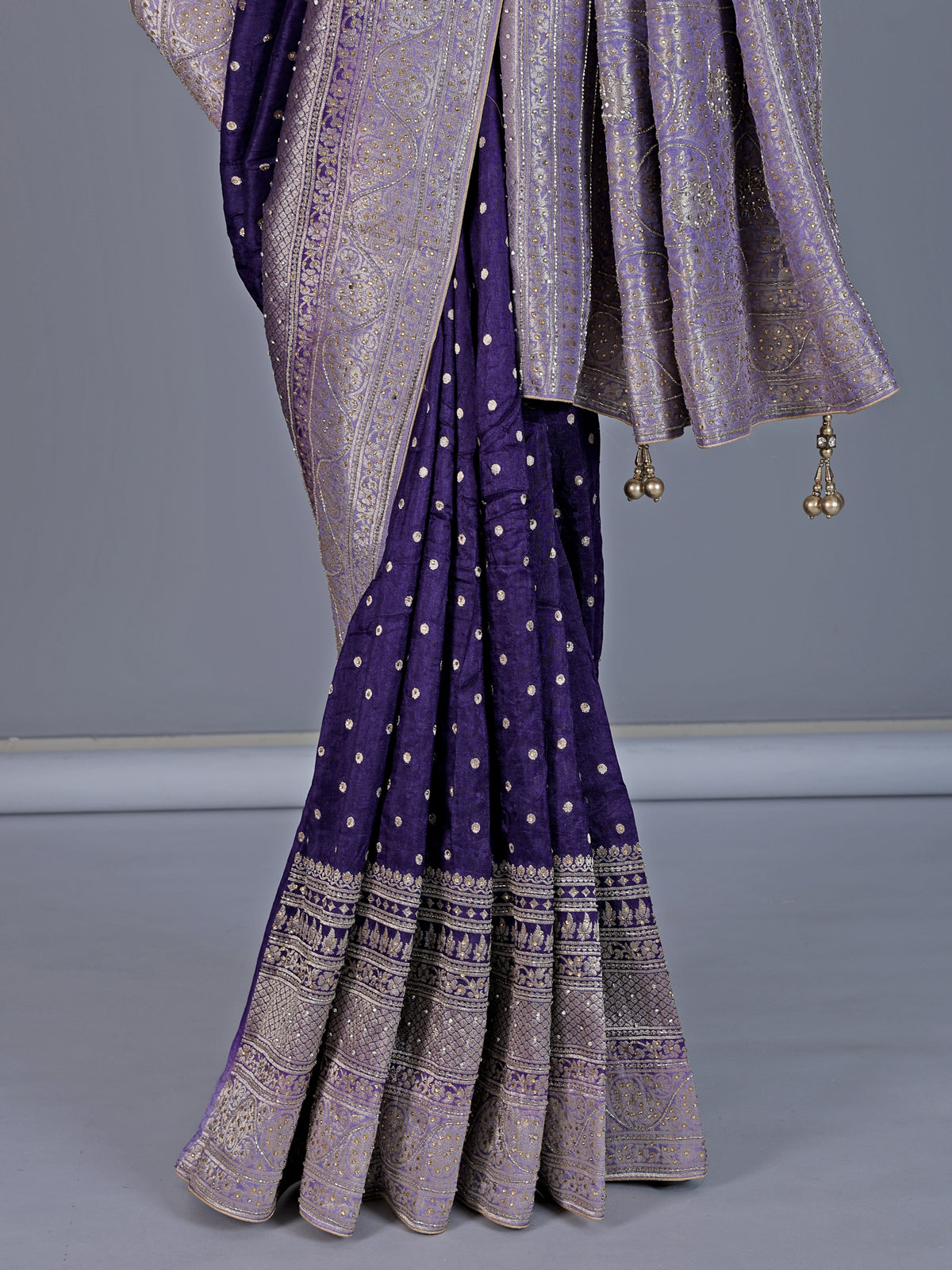 Purple dola silk saree with stone zari butti elegance