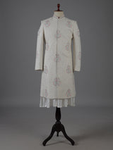 Cream cotton silk embroidered sherwani with regal detailing