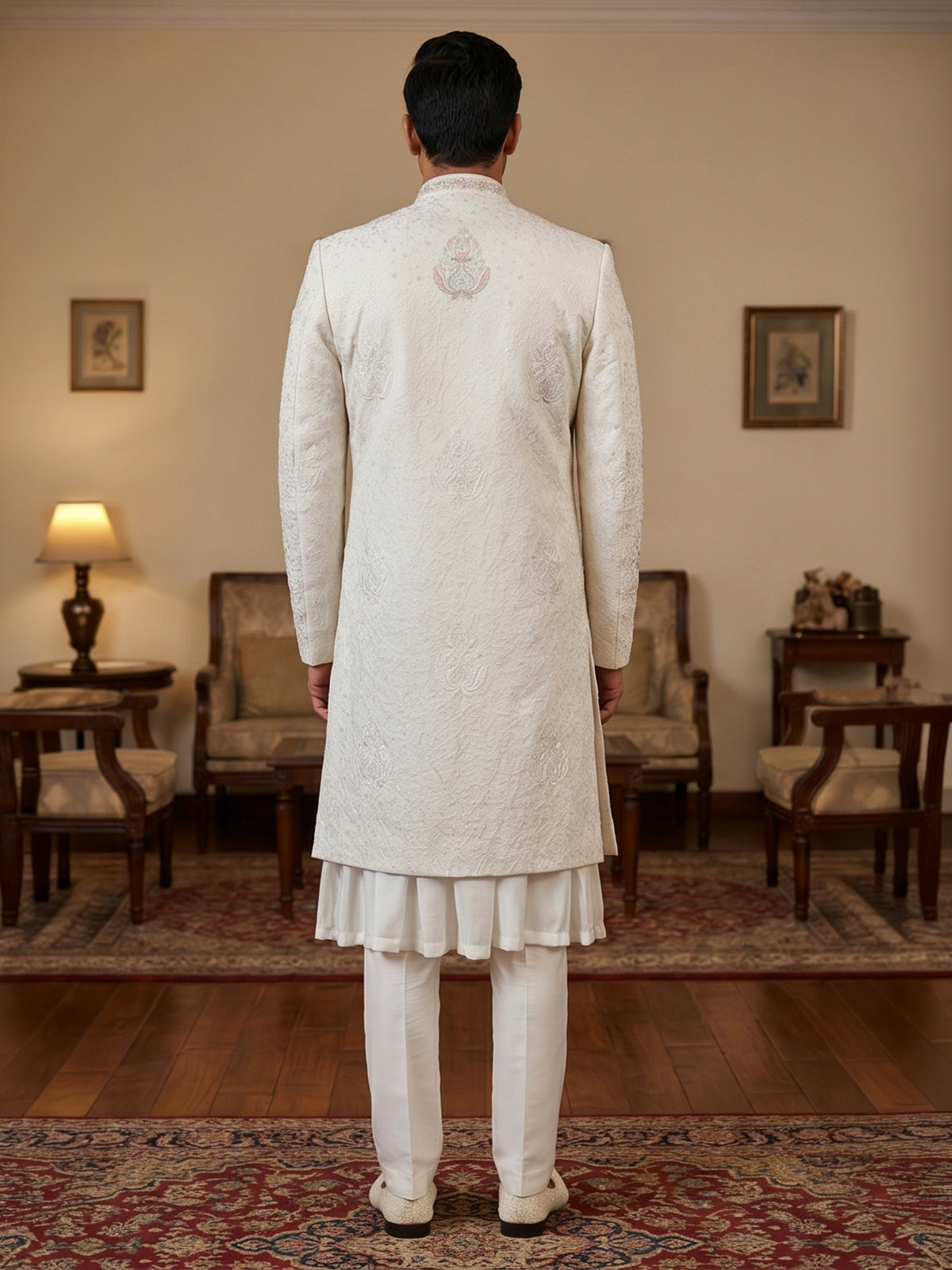 Cream cotton silk embroidered sherwani with regal detailing