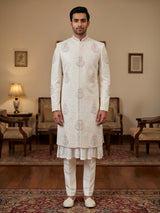 Cream cotton silk embroidered sherwani with regal detailing