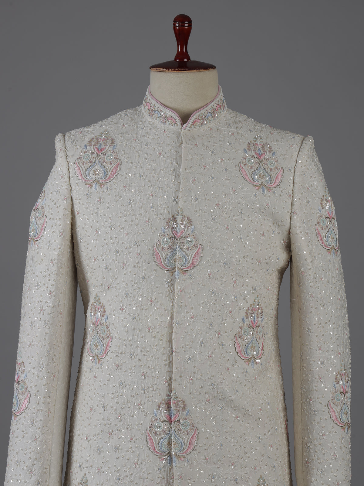 Cream cotton silk embroidered sherwani with regal detailing