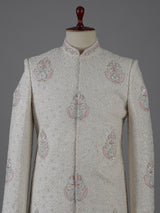 Cream cotton silk embroidered sherwani with regal detailing