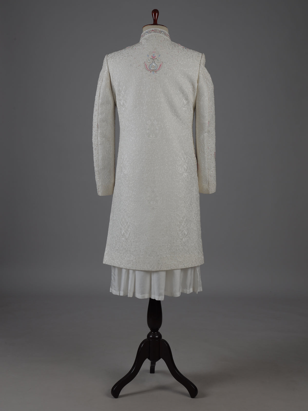 Cream cotton silk embroidered sherwani with regal detailing