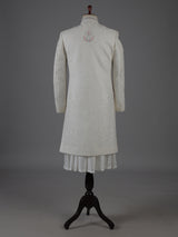 Cream cotton silk embroidered sherwani with regal detailing