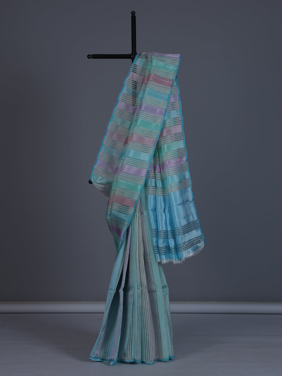 Sky blue striped organza saree for festive sangeet grace