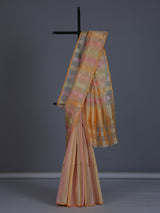 Peach striped organza saree for elegant sangeet evenings