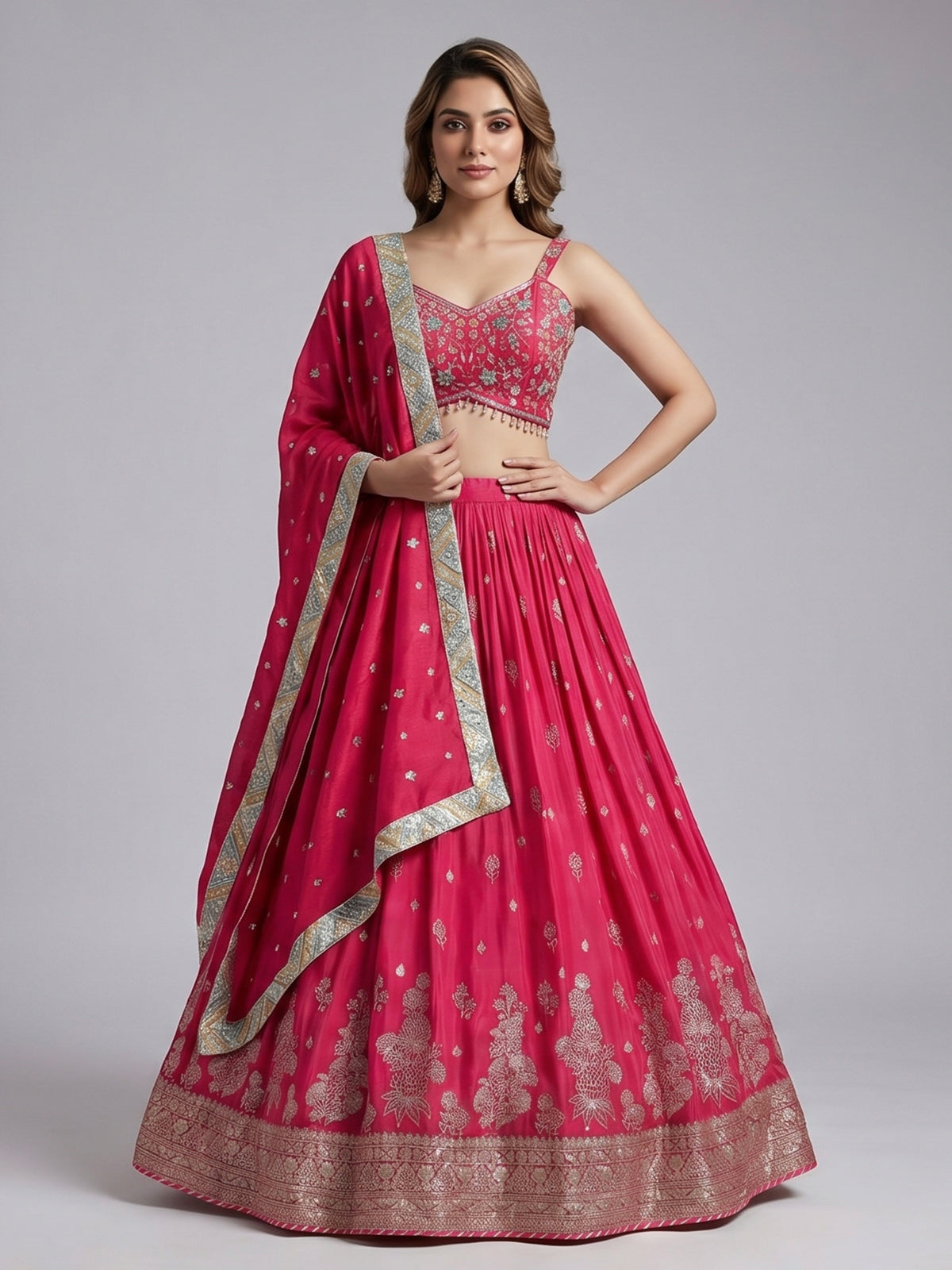 Rani pink silk lehenga choli with zardosi tassel detailing