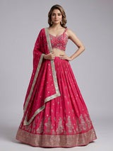 Rani pink silk lehenga choli with zardosi tassel detailing