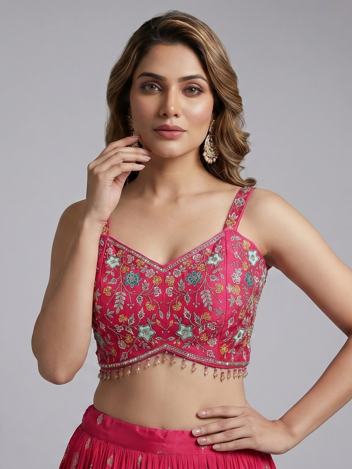 Rani pink silk lehenga choli with zardosi tassel detailing