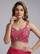 Rani pink silk lehenga choli with zardosi tassel detailing