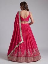 Rani pink silk lehenga choli with zardosi tassel detailing