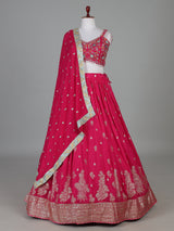 Rani pink silk lehenga choli with zardosi tassel detailing