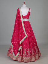 Rani pink silk lehenga choli with zardosi tassel detailing