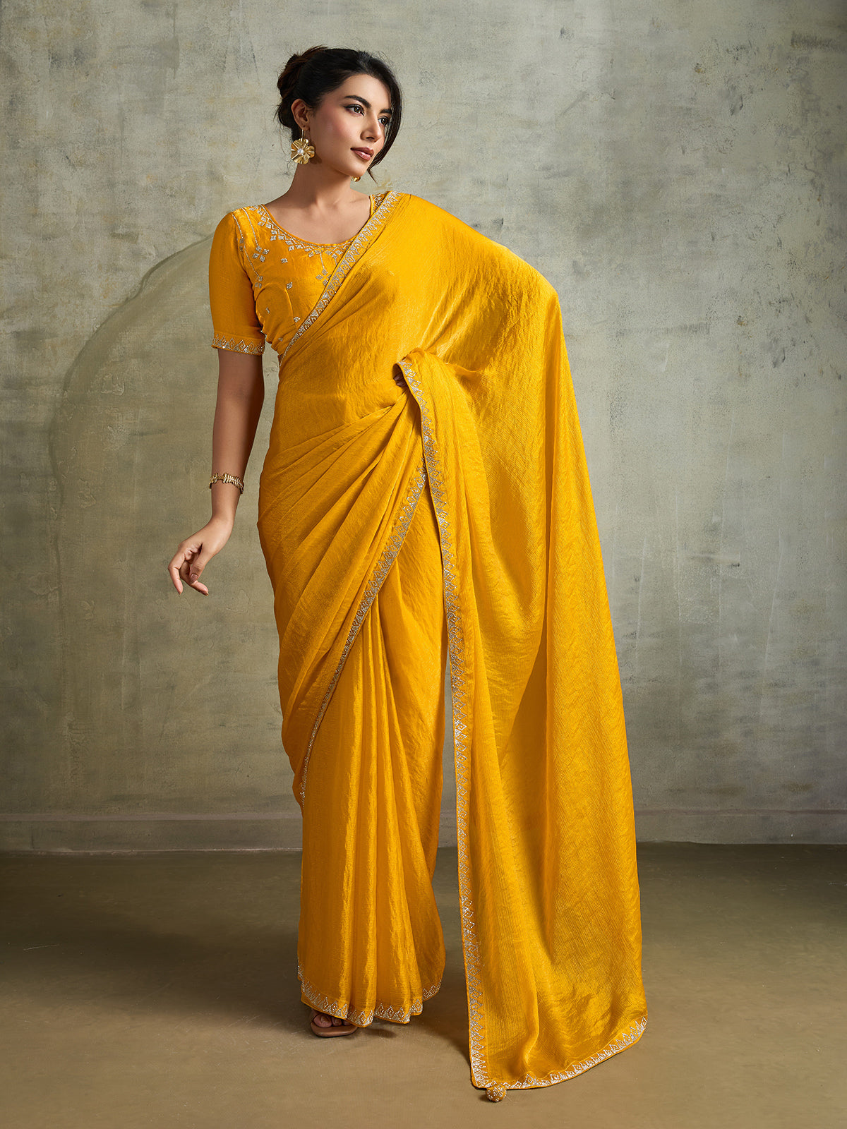 Radiant yellow chiffon festive partywear saree