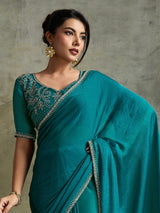 Stylish rama blue chiffon reception wear saree