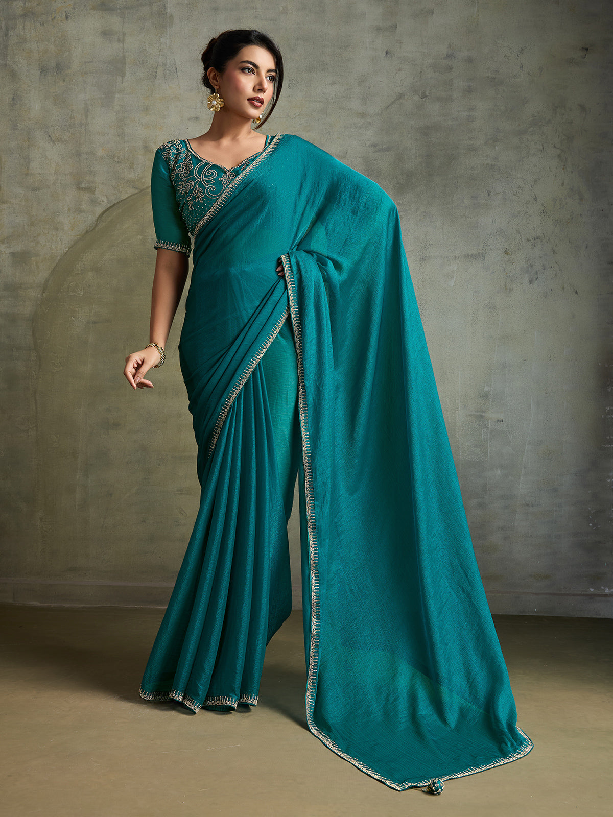 Stylish rama blue chiffon reception wear saree