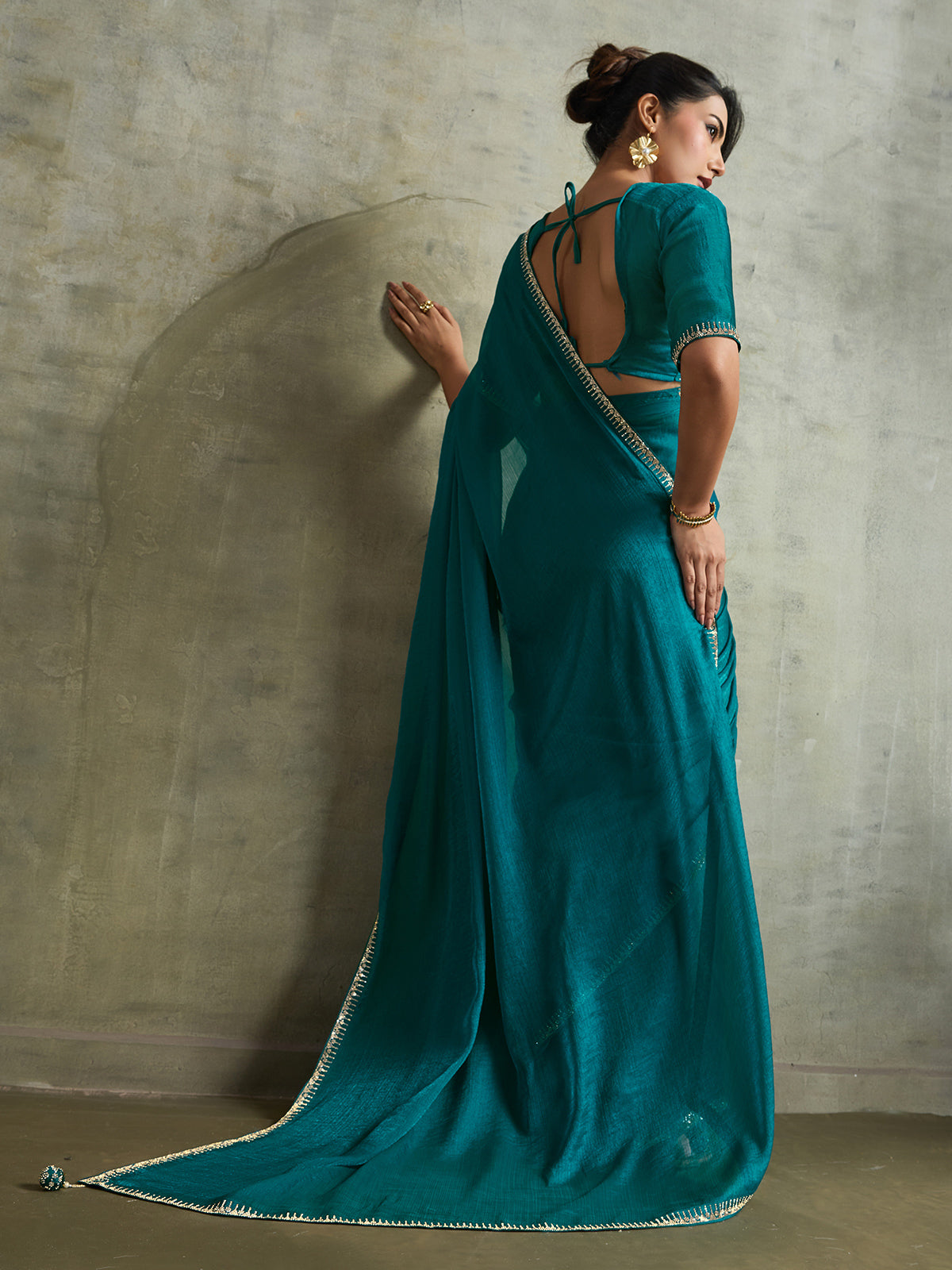Stylish rama blue chiffon reception wear saree