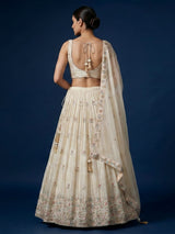 Cream silk lehenga choli with delicate embroidery