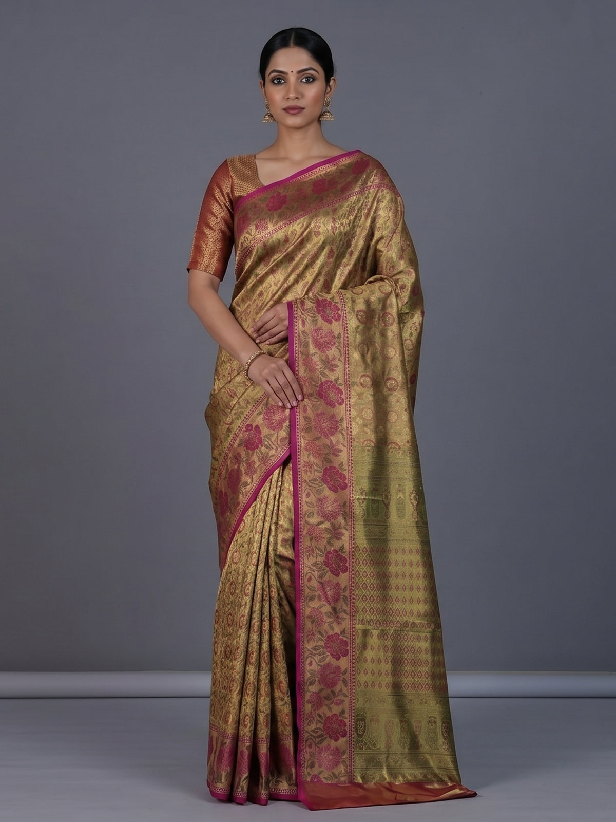 Golden Kanjivaram silk saree with floral motifs