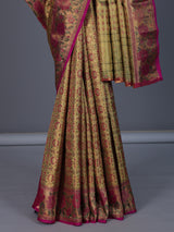 Golden Kanjivaram silk saree with floral motifs