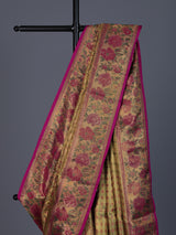 Golden Kanjivaram silk saree with floral motifs