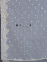 White organza tissue saree with graceful embroidered festive elegance