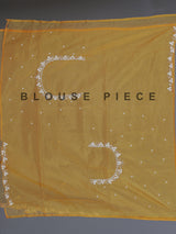 Mustard yellow organza tissue saree with festive sequins shimmer