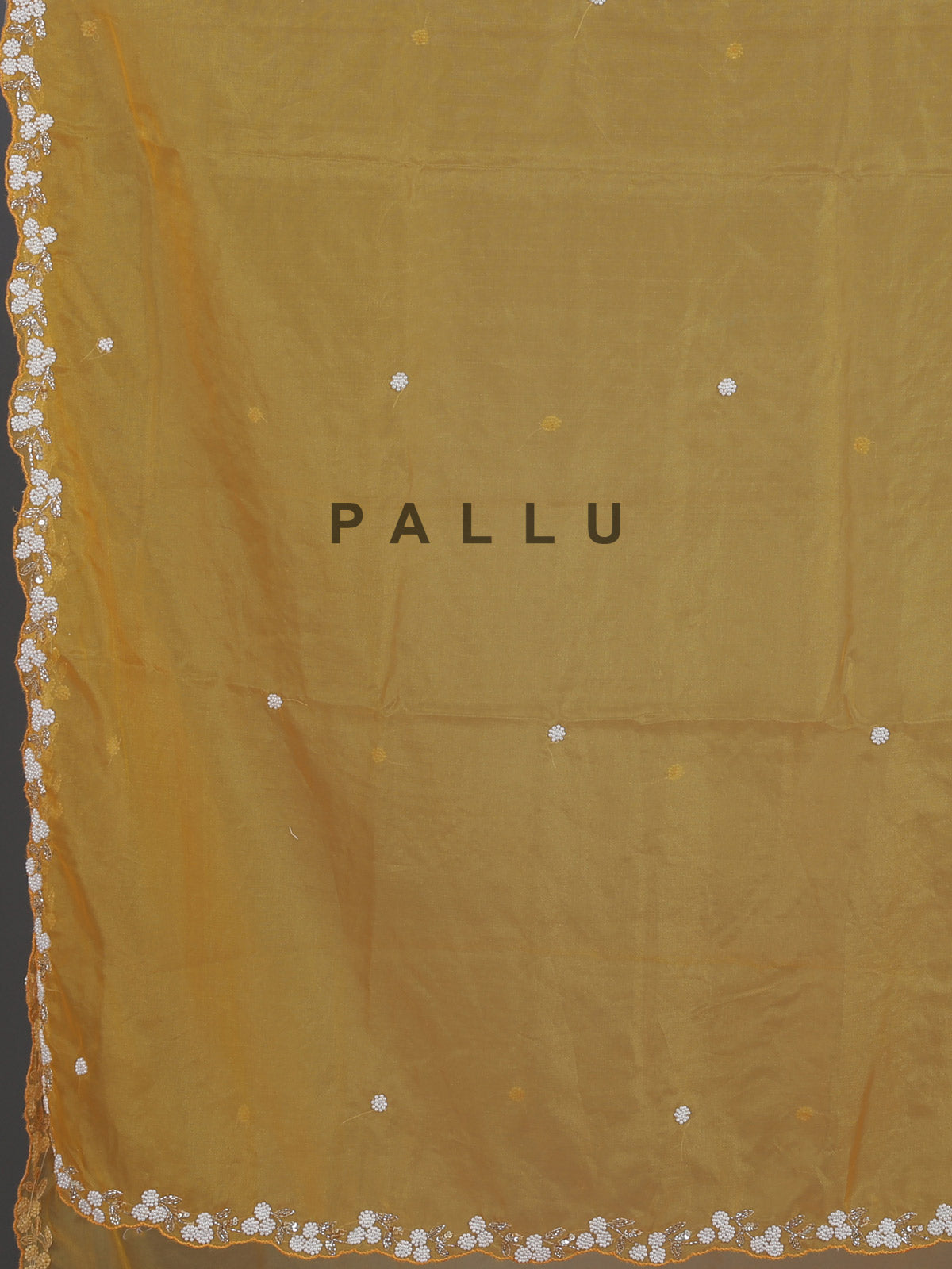 Mustard yellow organza tissue saree with festive sequins shimmer