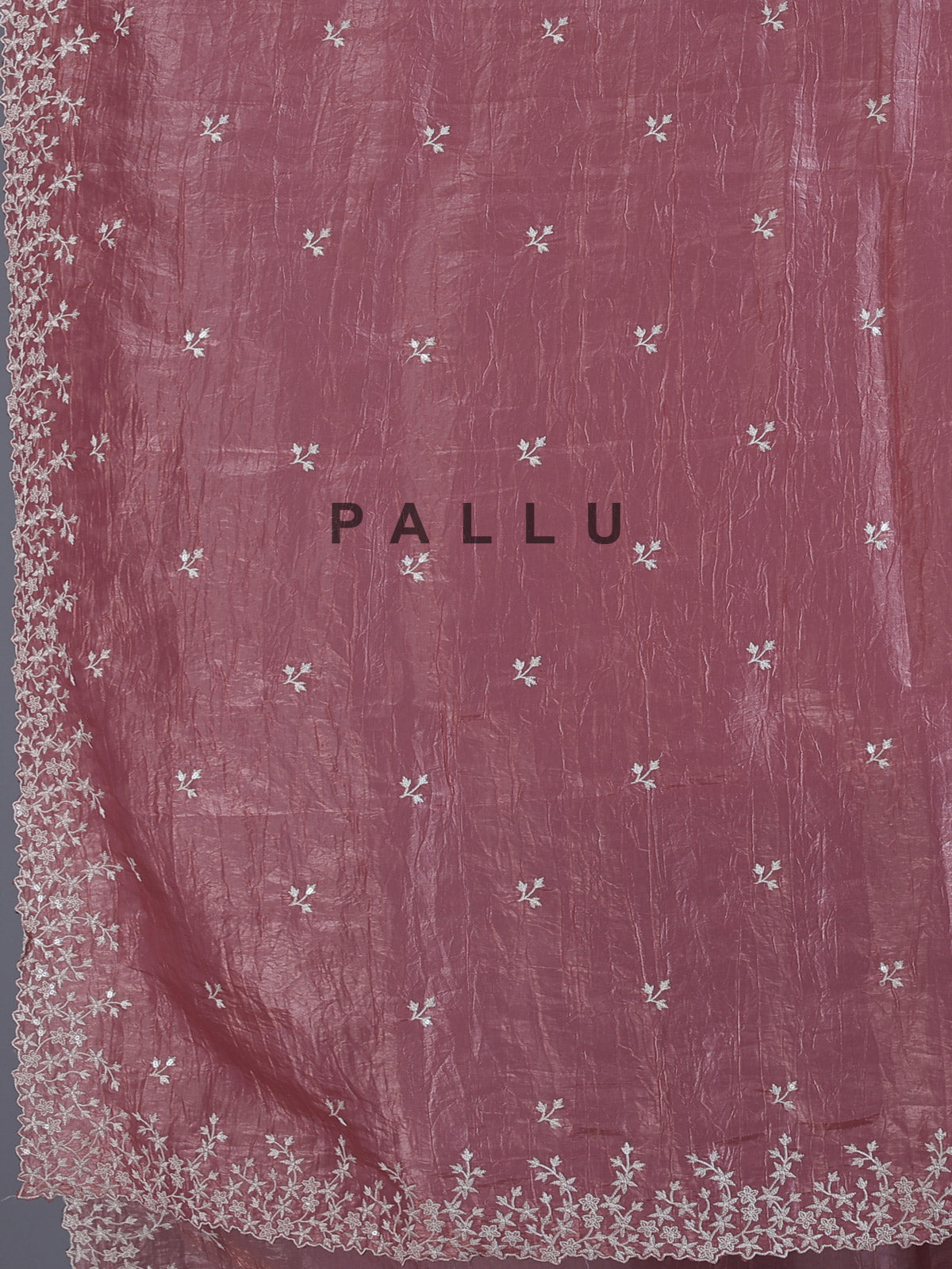 Onion pink tissue silk saree with shimmering festive elegance