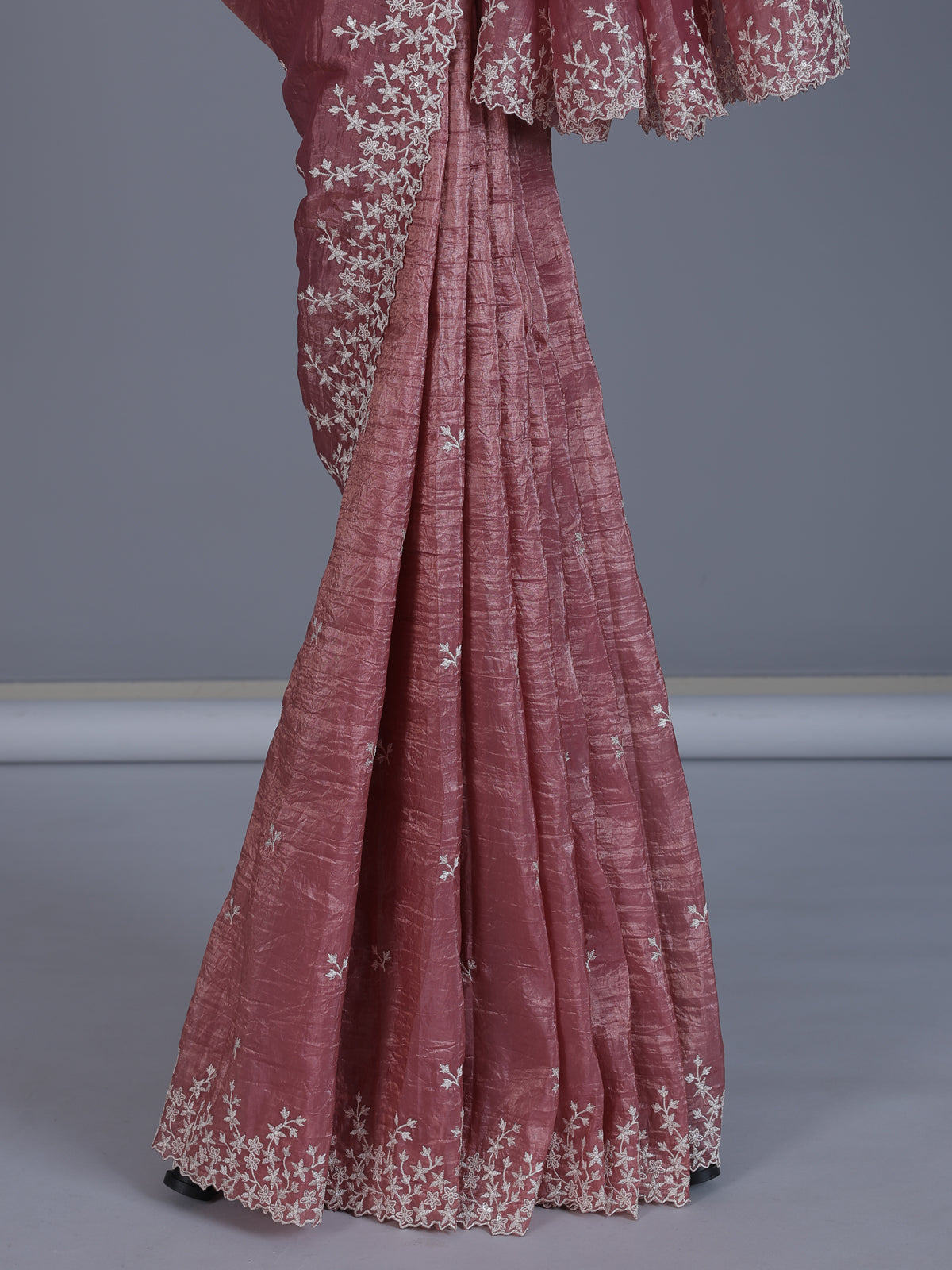 Onion pink tissue silk saree with shimmering festive elegance