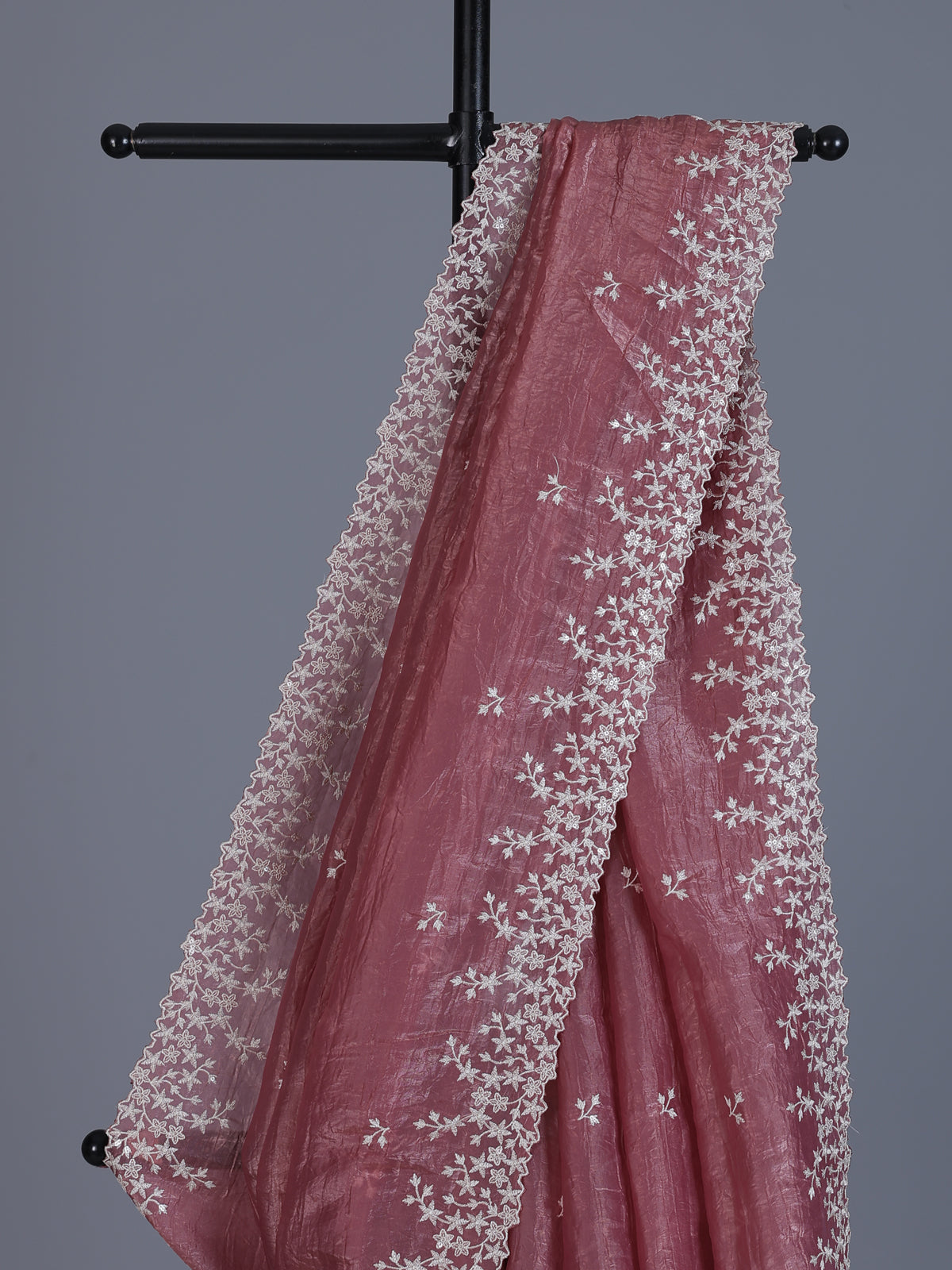Onion pink tissue silk saree with shimmering festive elegance