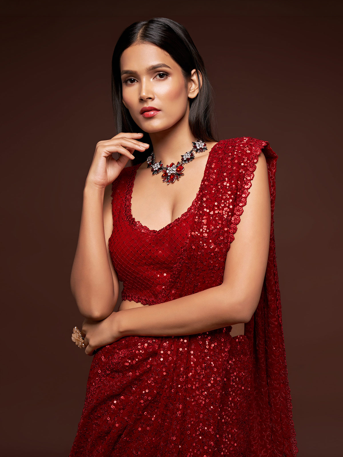 Luxurious ruby red embellished festive saree